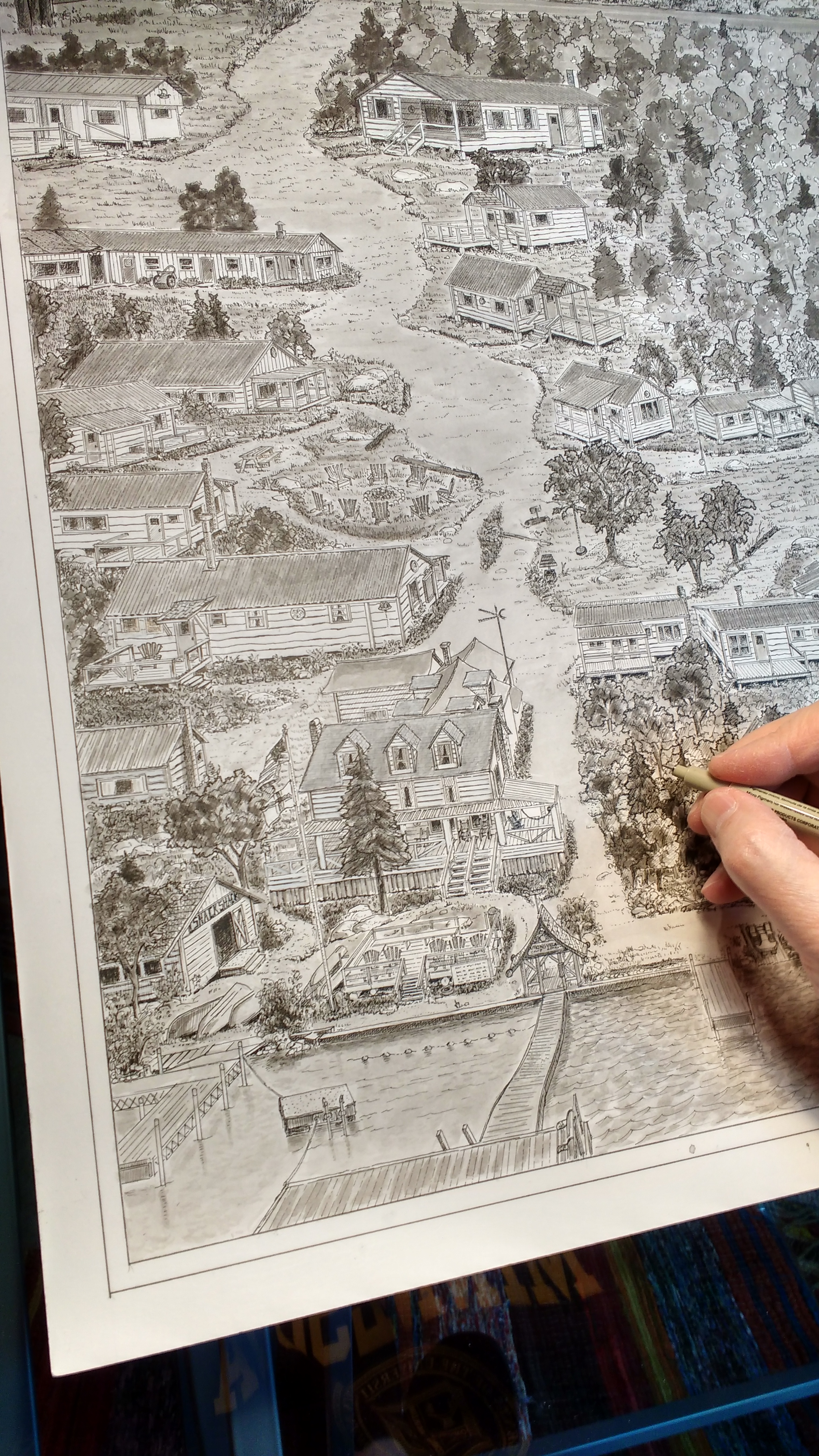 Artist at Work on Viking Village Drawing