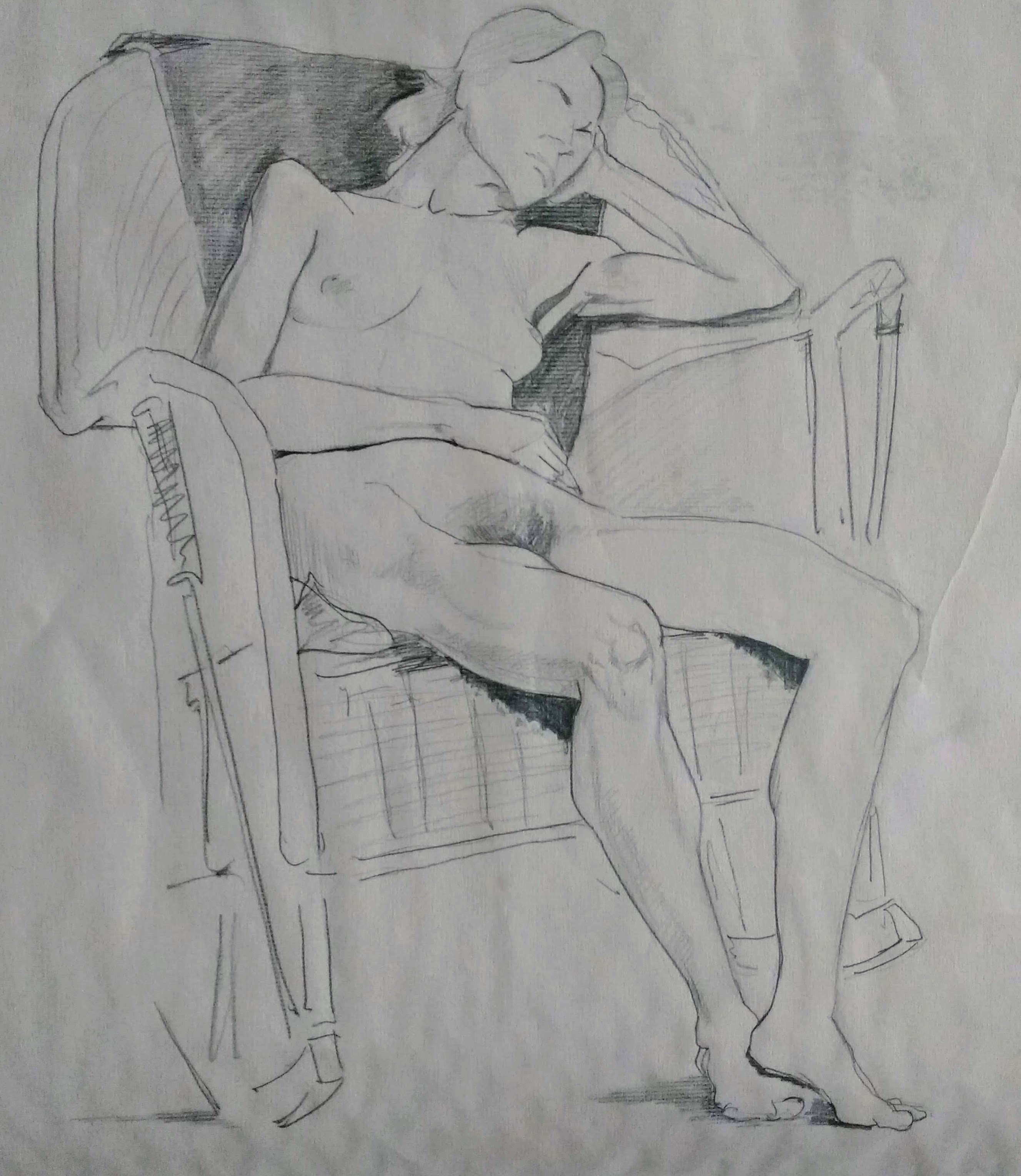 Seated Figure in Wooden Rocking Chair